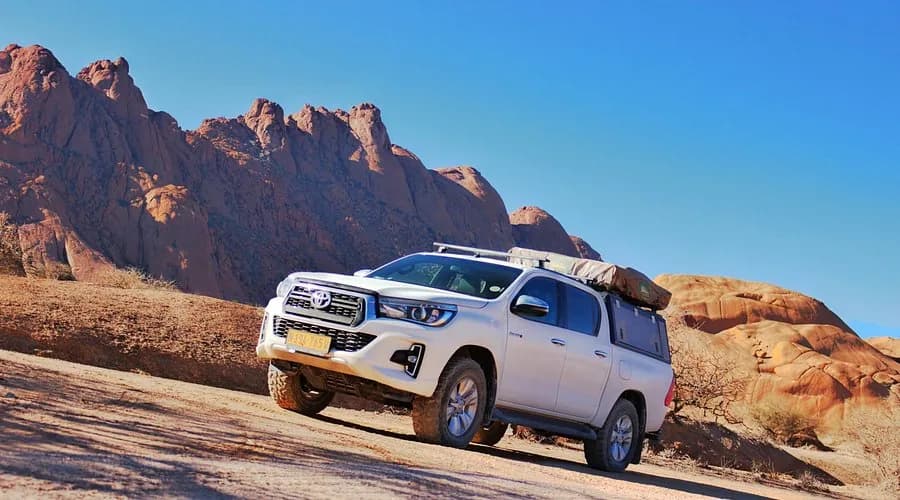 Toyota Fortuner against a Namibian mountain backdrop